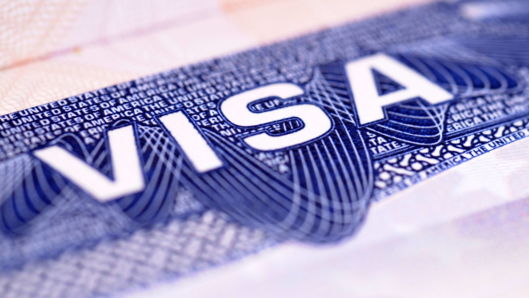 Closeup detail of a US visa document.